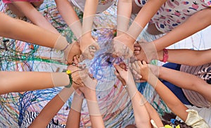 children 's hands in the form of a circle. the concept of unity of children