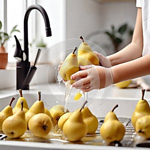 Children\'s hands wash pears. Selective focus