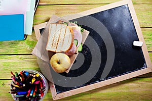 Children's lunch to school board, chalk, a space for inscription, apple, sandwich