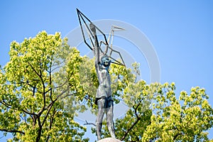 Children s Peace Monument with a statue of Sasaki Sadako in Hiroshima Peace Memorial Park, Hiroshima, Japan.