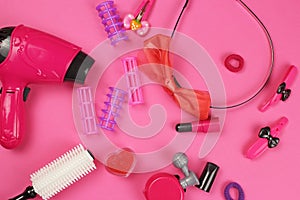 Children `s plastic toys-cosmetics, Barber set, on pink background, layout