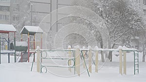 Children`s play complex near house during blizzards