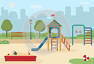 Children`s playground in the city park with toys, a slide, a sandpit.