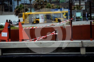 Children`s playground closed and wrapped in alarm caution tape for global coronavirus quarantine.No children on playgrounds.