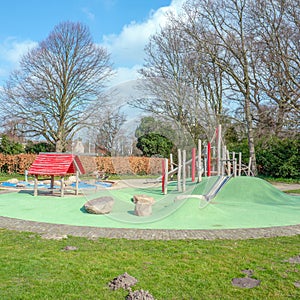 Children`s playground with a rubber floor.