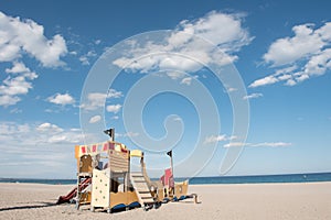 Children`s playground on the sandy beach.