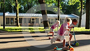 Children's push Scooter Race triplets baby girls