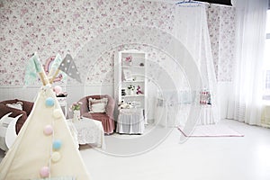 Children`s room with a bed and a canopy