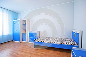 Children& x27;s room for a boy in blue colors, bedroom, game room