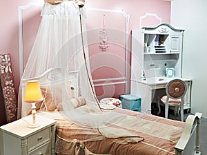 Children`s room with four-poster bed