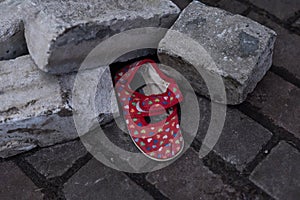 children's shoes in the ruins, the war