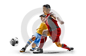 Children& x27;s soccer players in action isolated white background