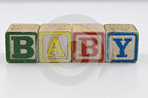 Children`s toy blocks spelling the word Baby