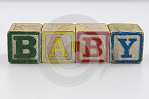 Children`s toy blocks spelling the word Baby