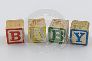 Children`s toy blocks spelling the word Baby