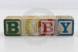 Children`s toy blocks spelling the word Baby