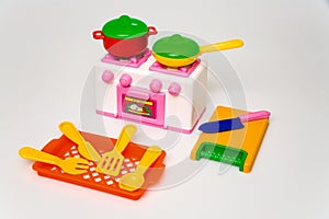 Children`s toy kitchen for girls. The concept of cooking. children`s games
