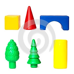 Children`s toy set with figures square, cylinder and trees, isolate