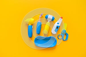 Children`s toys the game of the hospital. Flat lay The collection of games baby. Copy space