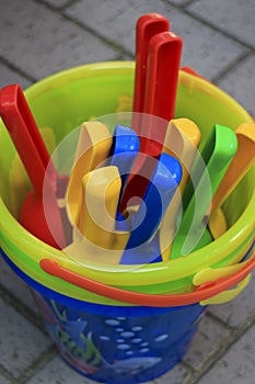 Children`s toys plastic buckets and shovels