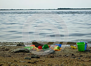 Children`s toys by the river