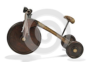 Children's tricycle on a white background