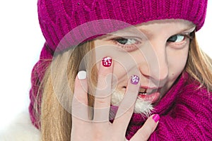 Children`s winter mixed colors manicure .