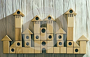 Children`s wooden designer from blocks of a different form