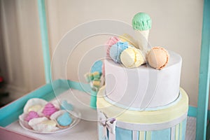 Children`s wooden and textile toys. Toy trolley with ice cream and cupcakes. Handmade textile ice cream close-up and copy space. B