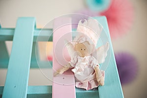 Children`s wooden and textile toys. Toy trolley with ice cream and cupcakes. Handmade textile ice cream close-up and copy space. B