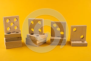 Children`s wooden toy sorter. Educational logic toys for kid`s close-up. Montessori Games for child development