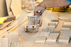 Children`s wooden toys in a carpenter`s workshop