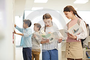 Children In School Library