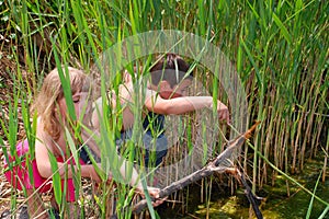 Children in sedge