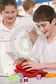 Children with sewing machine