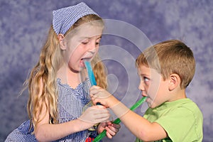 Children sharing popsicles photo