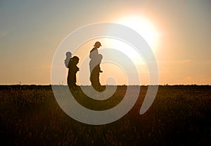 Children on the shoulders of parents