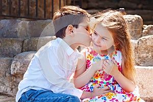 Children show love and affection to each other. Brother sister k