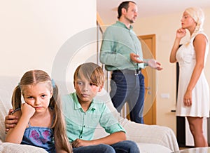 Children in silence while parents arguing