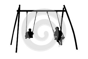 Children silhouette on swing