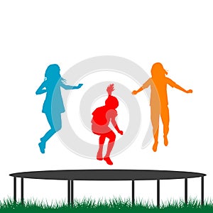 Children silhouettes jumping on garden trampoline