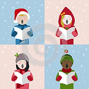 Children singing christmas carols in the snow