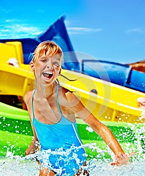 Children sitting on inflatable ring.