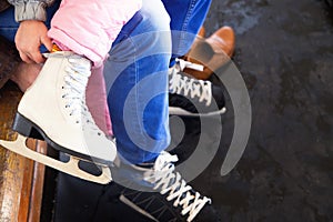 Children skating in winter