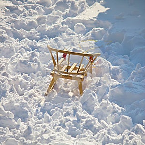 Children sledge in white snow