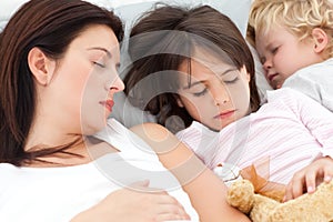 Children sleeping with their mother