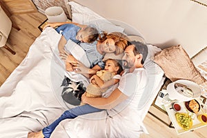 Children sleeping with their parents