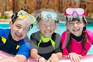 Children snorkeling in pool