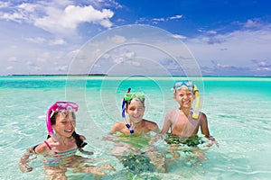 Children snorkeling in sea