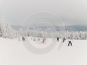 Children and some adults on the ski